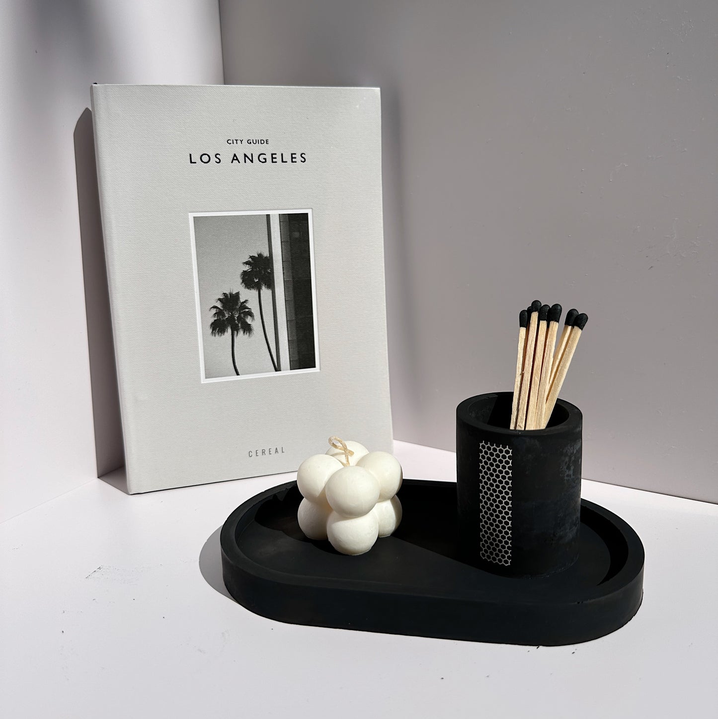 Round Match Stick Holder Set in Ash on Concrete Stone Tray with Candle